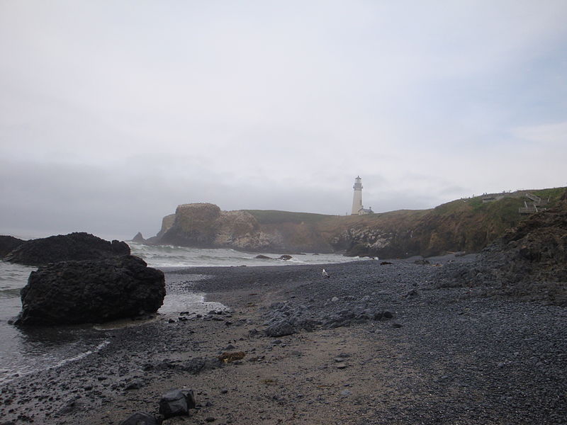 https://commons.wikimedia.org/wiki/File:Beach_View_of_Yaquina_Head_Lighthouse_-_Fog_Starting_to_Clear.JPG